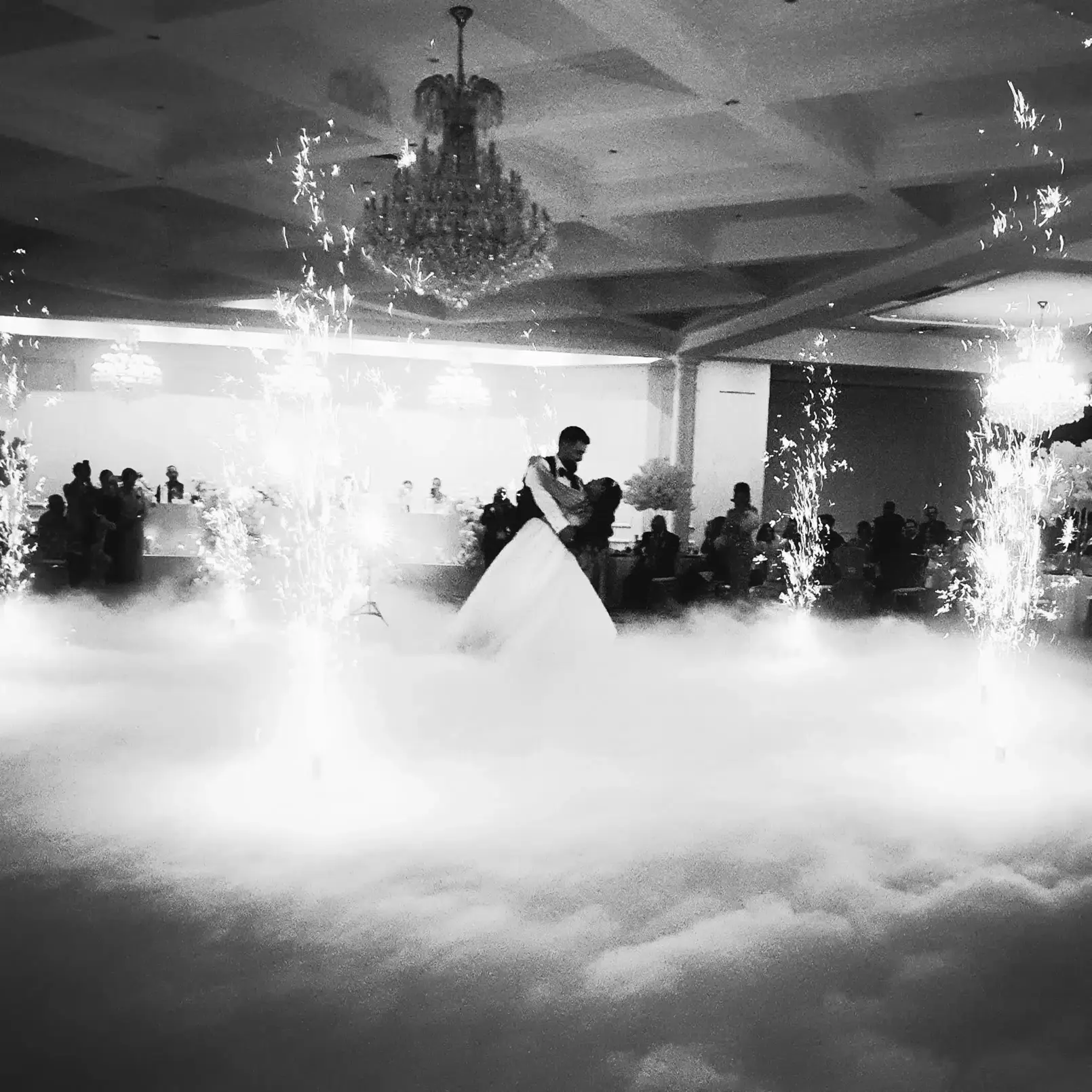 Bride and groom ballroom dancing at a wedding reception