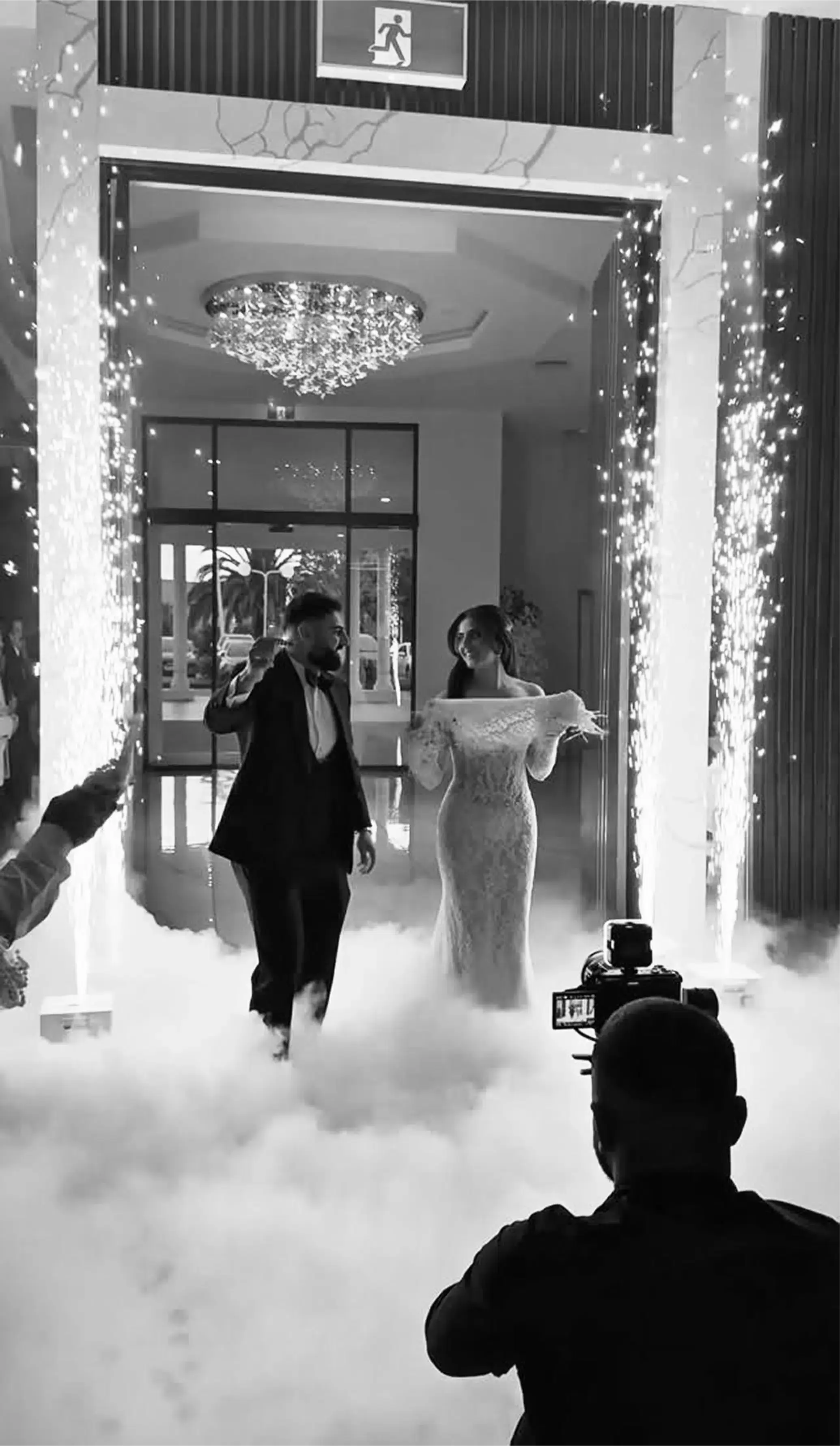 Bride and groom with a photographer at a wedding